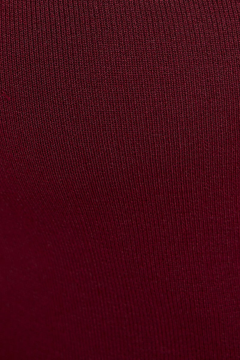 Haut en tricot extensible avec découpe (bourgogne)