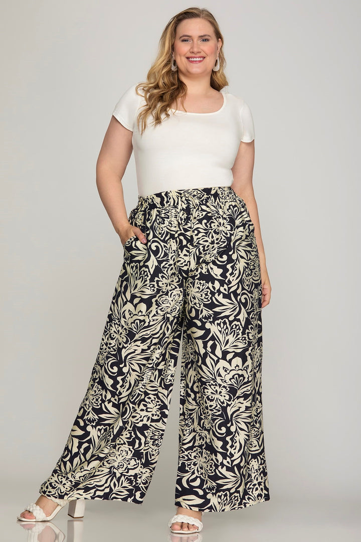 Pantalon palazzo marine à motifs